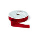 A spool of red ribbon with a portion unspoiled isolated on a white background.