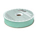 Spool of seafoam bias tape isolated on a white background