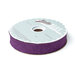 Spool of purple bias tape isolated on a white background