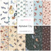 Fabric collection titled Alphabet City with various whimsical patterns featuring animals and letters.