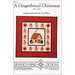 Cover design for A Gingerbread Christmas, featuring a gingerbread house and gingerbread figures.