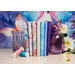 A stack of the fabrics included in the Flutter FQ set, with the panel in the background and vases and flowers and a butterfly and thread.