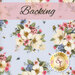 A floral fabric featuring white and pink flowers on a light blue background, labeled Backing.