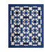 A patterned quilt featuring various blue and white star and geometric designs arranged in a grid.