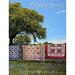 Cover of Prairie Song featuring quilts hanging outdoors under a tree with a blue sky background.