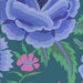 Vibrant floral pattern featuring large blue roses and small pink flowers on a green background.