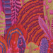 Vibrant tropical foliage with intricate patterns in shades of red, pink, purple, and green.