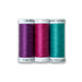 Three spools of thread in purple, fuchsia, and teal, isolated on a white background.