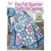 The front of the Fun Fat Quarter Quilts for Spring book featuring two of the designs hung on a ladder.