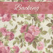 Cream fabric swatch with a tossed pink rose and leaf pattern with a pink banner at the top that reads 