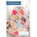 A colorful quilt featuring a patchwork design draped over a chair, with the title Craftsman above.