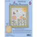 Cover of the Dresden Plate Homecoming pattern featuring a floral quilt design and butterflies.