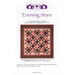 Image of a quilting pattern titled Evening Stars featuring a star design in pink and dark colors.