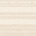 Up close of cream border stripe fabric featuring alternating stripes of lace like designs