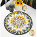 The completed Point of View Kaleidoscope topper colored in gray, white, and golden yellow fabrics staged on a white table with coordinating bee-themed decor.
