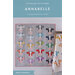 Cover of a quilting pattern titled Annabelle, featuring colorful cow designs on a quilt and fabric.