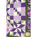 A close shot of the right edge of the quilt, demonstrating fabric, piecing, and border details.