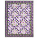 The completed Fresh Cut Roses Quilt colored in white, purple, and green prints from the Plum Petals fabric collection, isolated on a white background.
