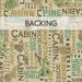 A swatch of tan fabric with outdoorsy words, tree branches, and pinecones. A gray-blue banner at the top reads 