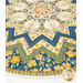 Up-close of the table topper showcasing fabrics and top quilting details