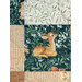 Patchwork quilt featuring playful animal illustrations, including a fawn amidst floral patterns.