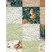 Close-up of the patchwork crib quilt featuring woodland animals among floral patterns.