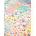 A close up of the quillow demonstrating playful cat themed fabrics and top quilting details. 