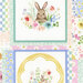 An 8x8 close up scan of the panel, showcasing two white squares with watercolor paintings of bunnies with flowers.