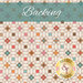 A swatch of light cream fabric with overlapping geometric circles. A teal banner at the top reads 