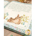 A close up on the open panel book, showing details on two cute bunnies.