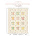 Front cover of the pattern showing the completed Quilt project and the Bunny Hill Logo.