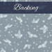 Cadet blue fabric with stars, moons, and tonal owls in flight. A navy blue banner at the top reads 