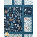 A close up of the patchwork quilt featuring woodland animal designs in blue, teal, and cream.