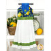The completed Hanging Towel colored in blue and green fabrics from the Limoncello collection, staged on a kitchen drawer with coordinating decor.
