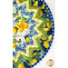 A top down view of the topper, demonstrating fabric, prairie point, and binding details.