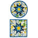 The two completed Folded Star Hot Pads in white, isolated on a white background.