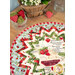 A top down view of the topper staged next to coordinating strawberry decor.