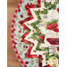 A top down view of the topper, demonstrating fabric, prairie point, and binding details.