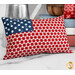 A rectangular decorative pillow featuring a red, white, and blue pattern resembling the American flag.
