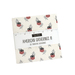 Quilt fabric bundle featuring small red, white, and blue motifs on a cream background.