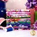 A stack of the fabrics included in the Blissful Blooms Fat Quarter Bundle, with flowers and vases and thread.