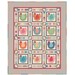 The Hen House appliqué and patchwork quilt featuring twelve colorful chicken designs in a grid layout with a patterned border.