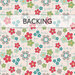 Light gray fabric with colorful flowers with a transparent backing label at the top.