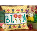 A head on shot of the finished pillow wrap, staged with coordinating decor.