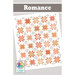 A quilt pattern titled Romance featuring a variety of peach, coral, and white star designs.