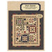 The front of the pattern featuring a digital version of the finished quilt on a fabric background.