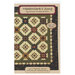 The front of the pattern featuring a digital version of the finished quilt on a fabric background.