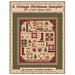 The front of the pattern featuring a digital version of the finished quilt on a fabric background.