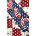 A super close shot of the American flag piecing in the middle of the quilt, colored in red, cream, and blue textured patriotic fabrics. 