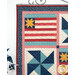 A close up on one of the flag blocks of the wall hanging, showing details on the cream and red stripes as well as the small yellow star.